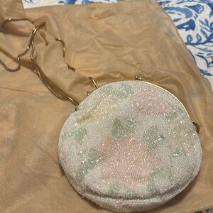 Gorgeous flower beaded design on off white evening bag